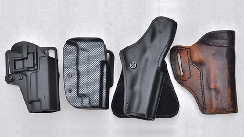 Collection of four different holster designs showcased on white