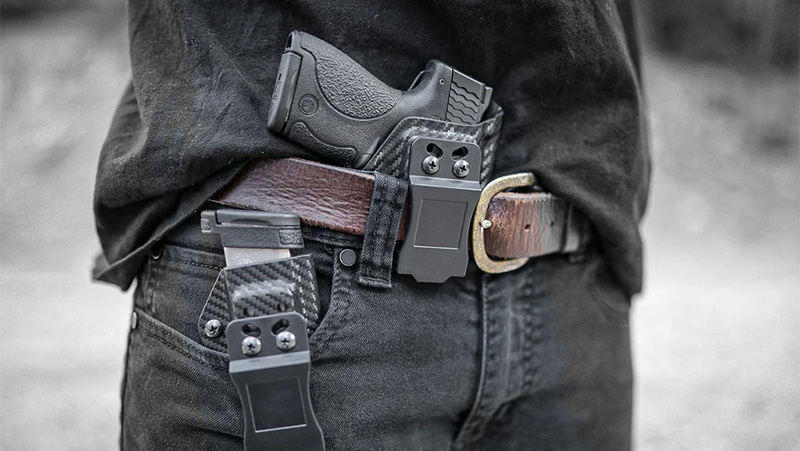 A man with a gun in an inside-the-waist holster