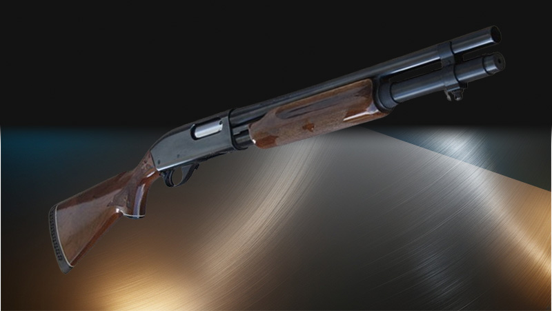 A brown Remington 870 Wingmaster shotgun