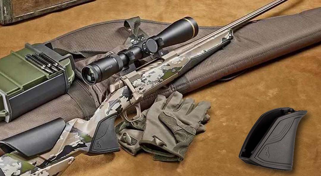 A camouflage Browning X-Bolt with scope, ammunition, shooting gloves, and stock lying around