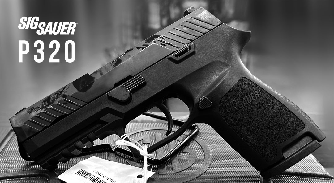 A black Sig Sauer P320 handgun